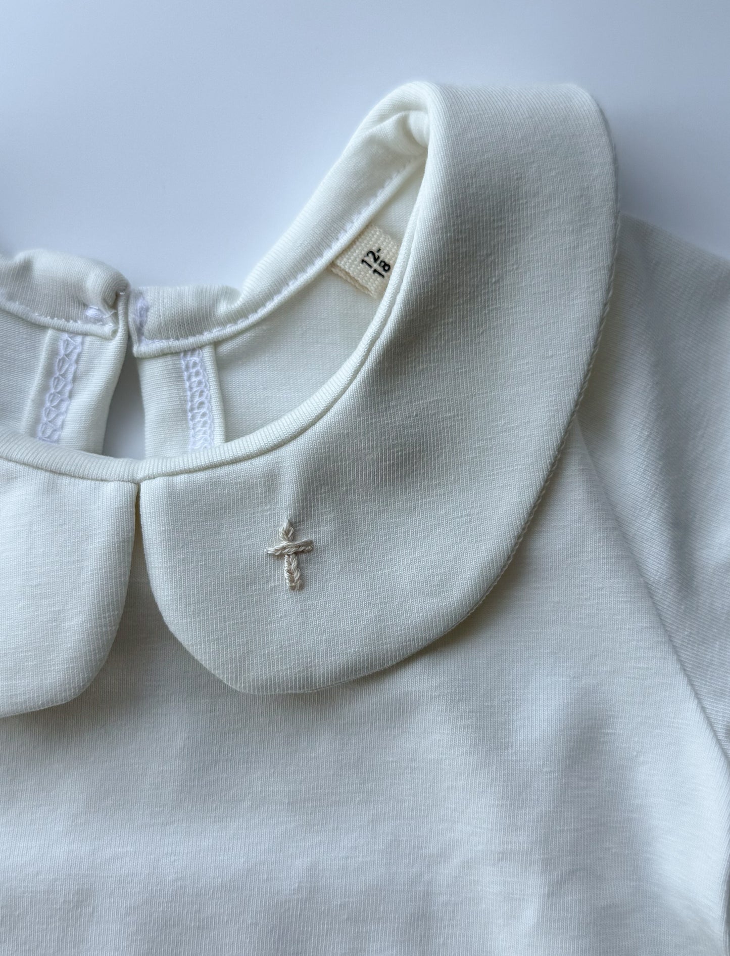 Hand Embroidered Cross detail